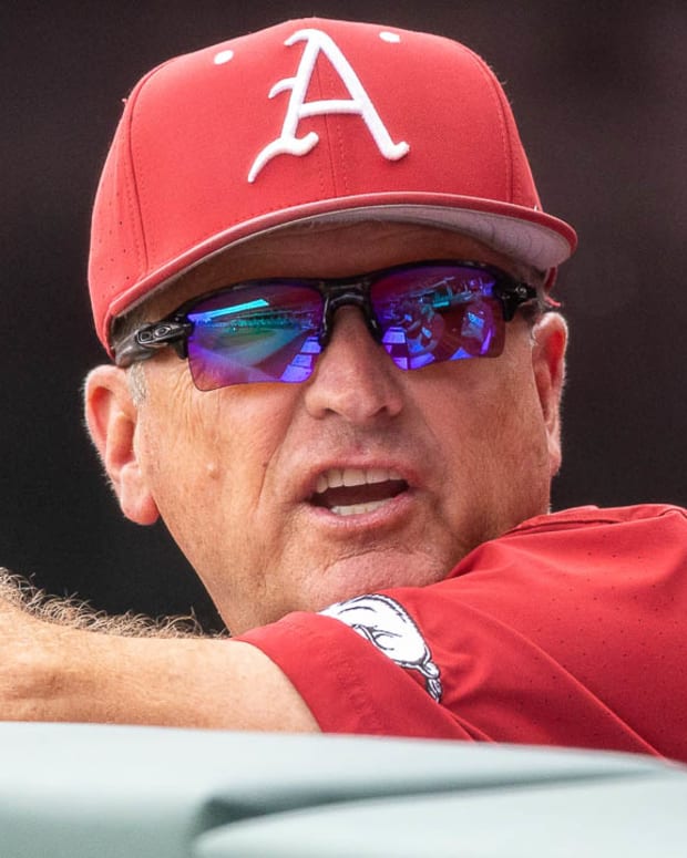 Razorbacks coach Dave Van Horn in the dugout during Sunday afternoon's game against TCU.